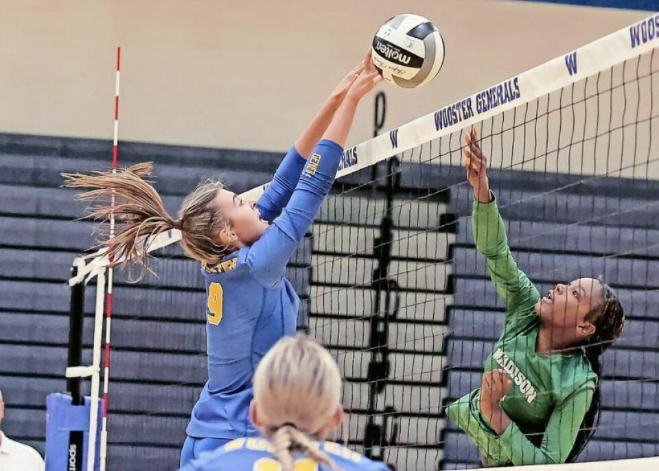 Grace Jones, left, was a second-team All-Ohio Cardinal Conference player for the Wooster High volleyball squad that recently completed a 22-0 regular season. WHS volleyball completes its perfect regular season
