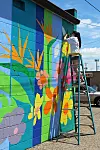 Art community comes together to complete new mural
