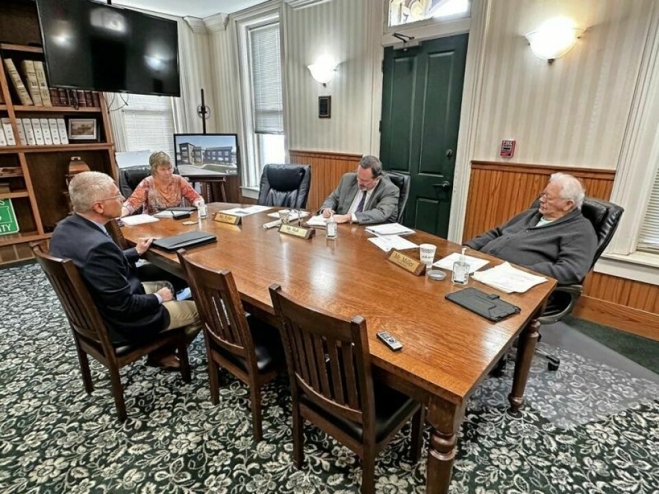 Holmes County Juvenile bailiff Brad Conn, left, recently met with Holmes County commissioners to get a letter of approval for his grant submission to the state requesting funds that would help provide a generator for the Holmes County Courthouse. County courthouse seeks state grant for new generator
