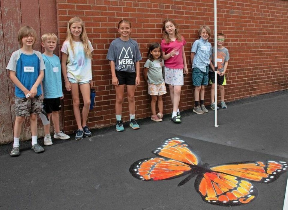 After Wayne Center for the Arts staffers laid out more monarch butterflies on the pavement n the alley between Spoon Market and Deli and Local Roots Market and Cafe with stencils and spray paint, young artists from WCA’s arts camp brought them to life with vibrant colors. MSW, WCA launch butterfly art project downtown