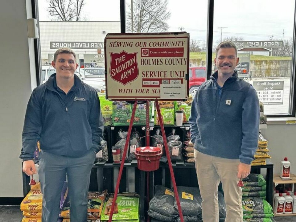 Hayden Mobley, left, and Jonathan Clark from Killbuck Savings Bank ring The Salvation Army red kettle bell during the holiday season. It is because of volunteers like this and donors who freely give what they can that The Salvation Army can turn the funds raised in Holmes County right back into a blessing to Holmes County families in need. Red Kettle Campaign collects over $26,000