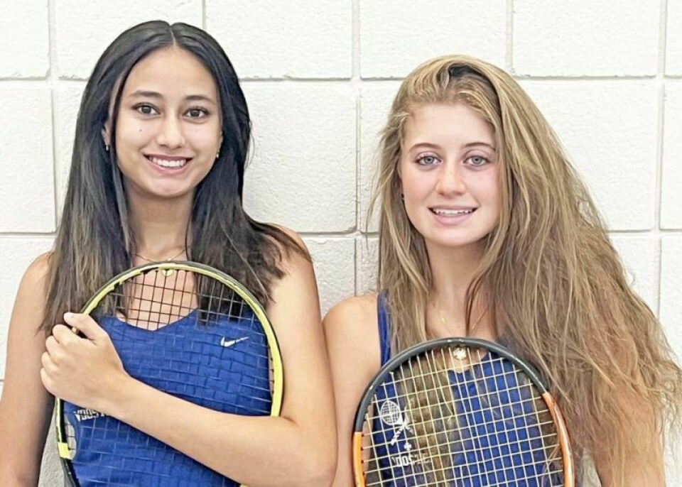 Senior Alexia Kakanuru, left, and junior Ava Mathur will be Wooster High’s top two singles players this year. New WHS coach plans to keep net tradition going