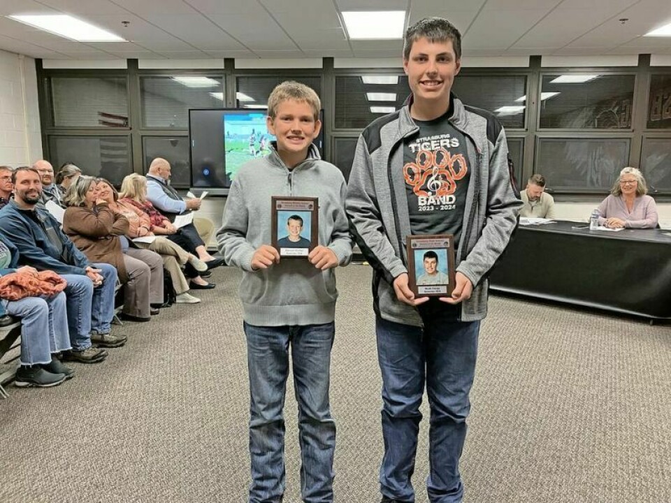 Deacon Dreher, middle school, left, and Noah Zaugg, high school, are November Student of the Month recipients. Board recognizes November Students of the Month