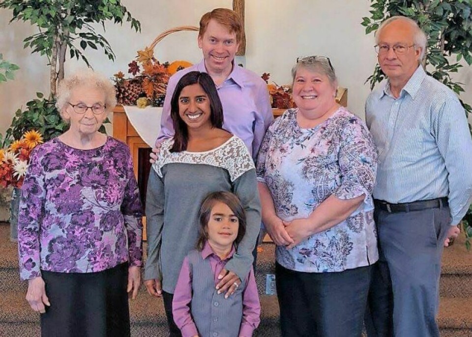 Emily Baddorf, middle, stands in front of her husband Gary with her son Canaan in front. On the right are Baddorf's adoptive parents and on the left, her grandmother. For local adoptee, her adoption was true blessing