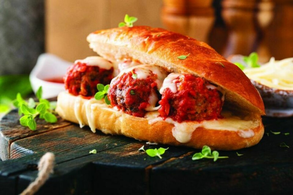 The menu includes meatball subs, macaroni and pasta salads, veggie cups, and cupcakes. Free meal offered