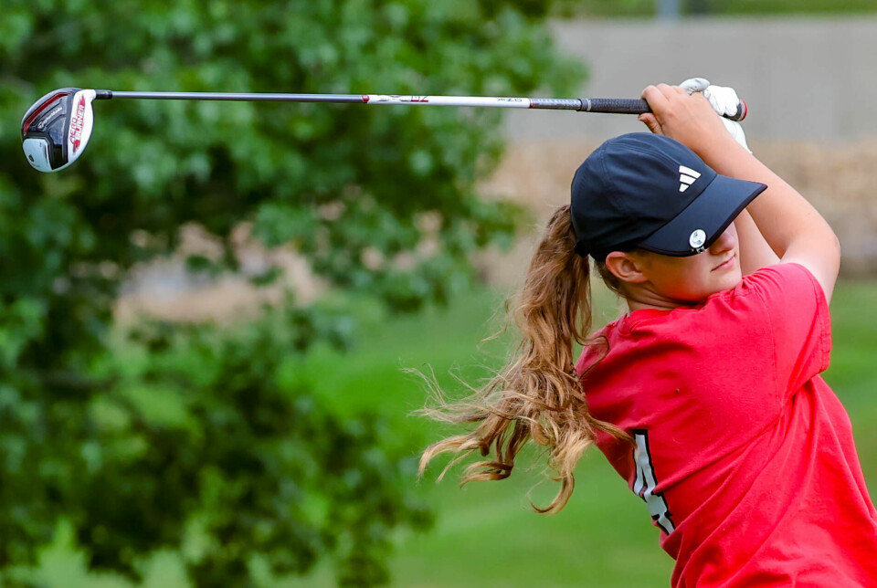 Hiland's Olivia Yoder takes a swing.