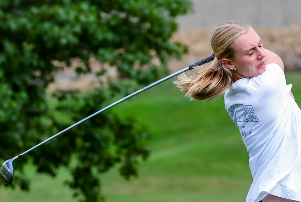 Hiland's Lydia Johnson takes a swing.