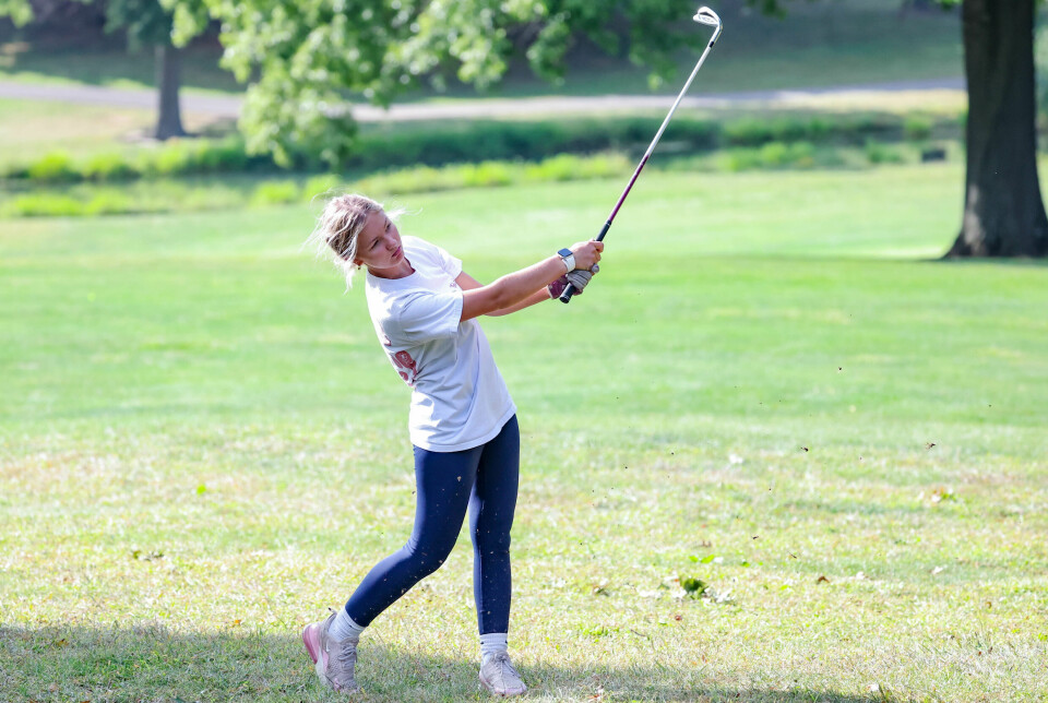Hiland's Kylie Miller hits a shot from the fairway.