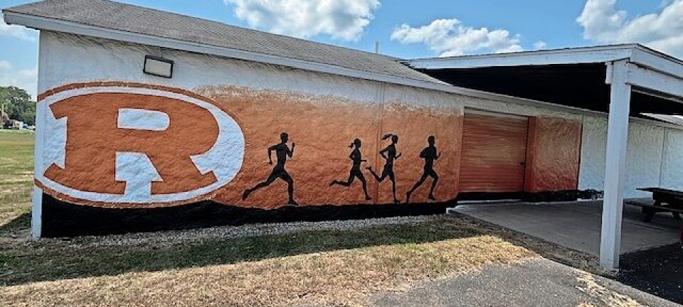 Mural brings pride and color to Ridgewood cross country building