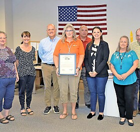 State Rep. Craig recognizes Traci Poulson for 30 years of public service