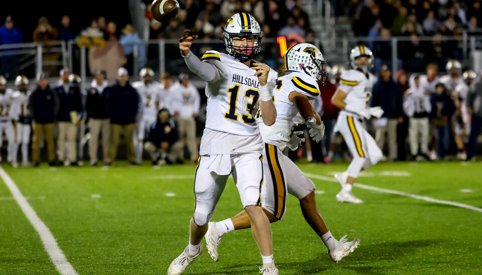 Hillsdale quarterback Kael Lewis fires this pass and finished 9-of-20 passing for 70 yards.
