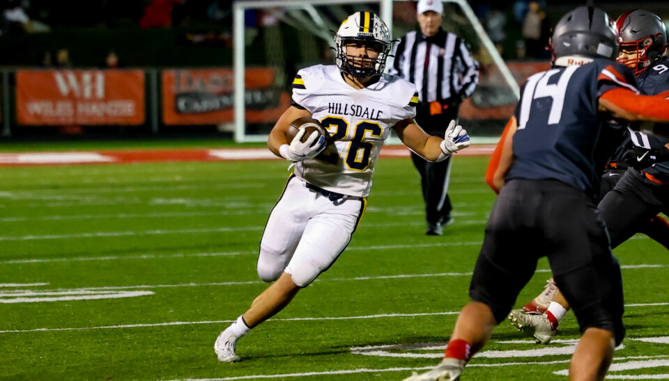 Hillsdale's Owen Sloan races for some second half yards and finished with 169 yards on 23 carries.