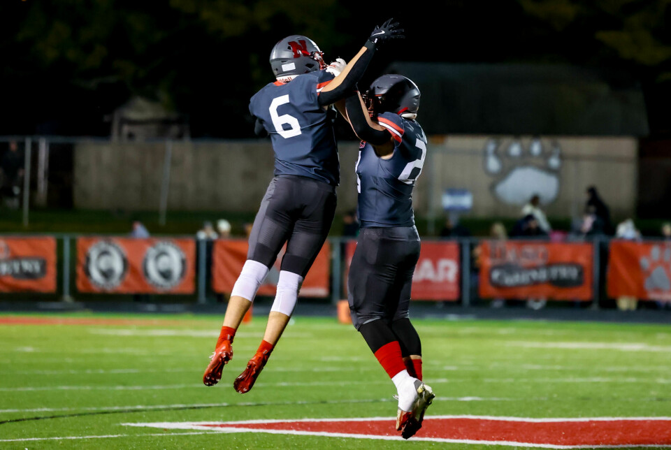 Norwayne's Matthew Troup (6) celebrates the win against Hillsdale with a teammate.